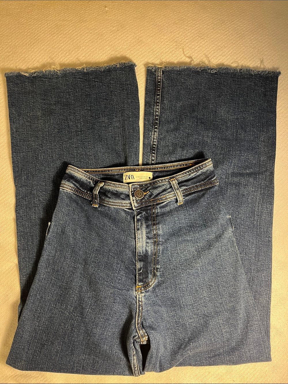 Zara Wide-Leg Flared Jeans in Medium Blue Denim with Raw Hem